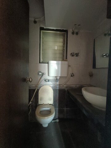 Bathroom in 3 BHK Apartment at Evershine Woods, Mira Road – for Rent
