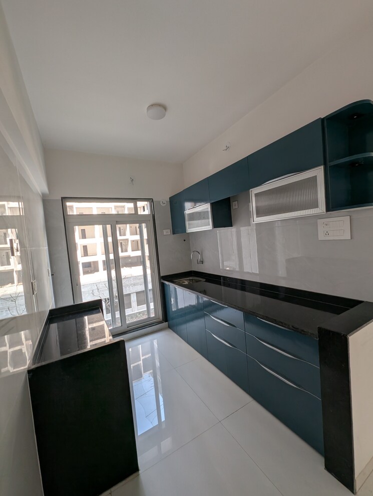 Kitchen, millennium-flora 2 Bedroom 768 Sq.Ft. Apartment In New Panvel Sector 17 Navi Mumbai 8174591