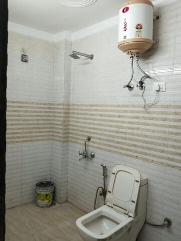 Bathroom in 1.5 BHK Apartment at Savitri Nagar – for Sale