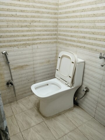 Bathroom in 1.5 BHK Apartment at Savitri Nagar – for Sale