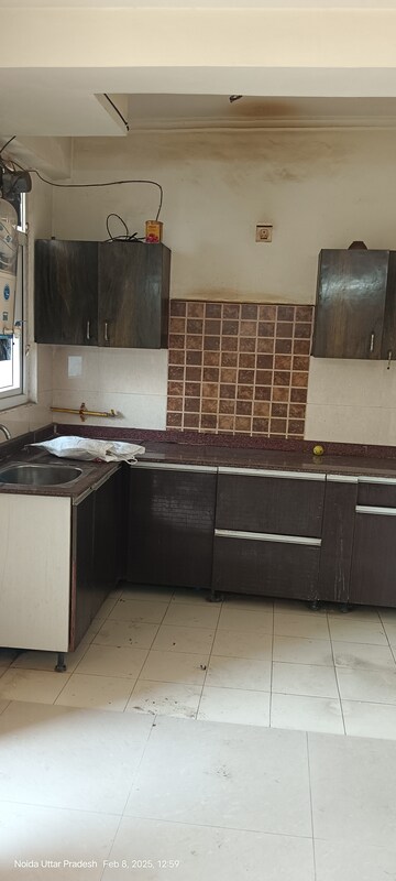 Kitchen in 2.5 BHK Apartment at Amrapali Zodiac, Sector 120 – for Rent