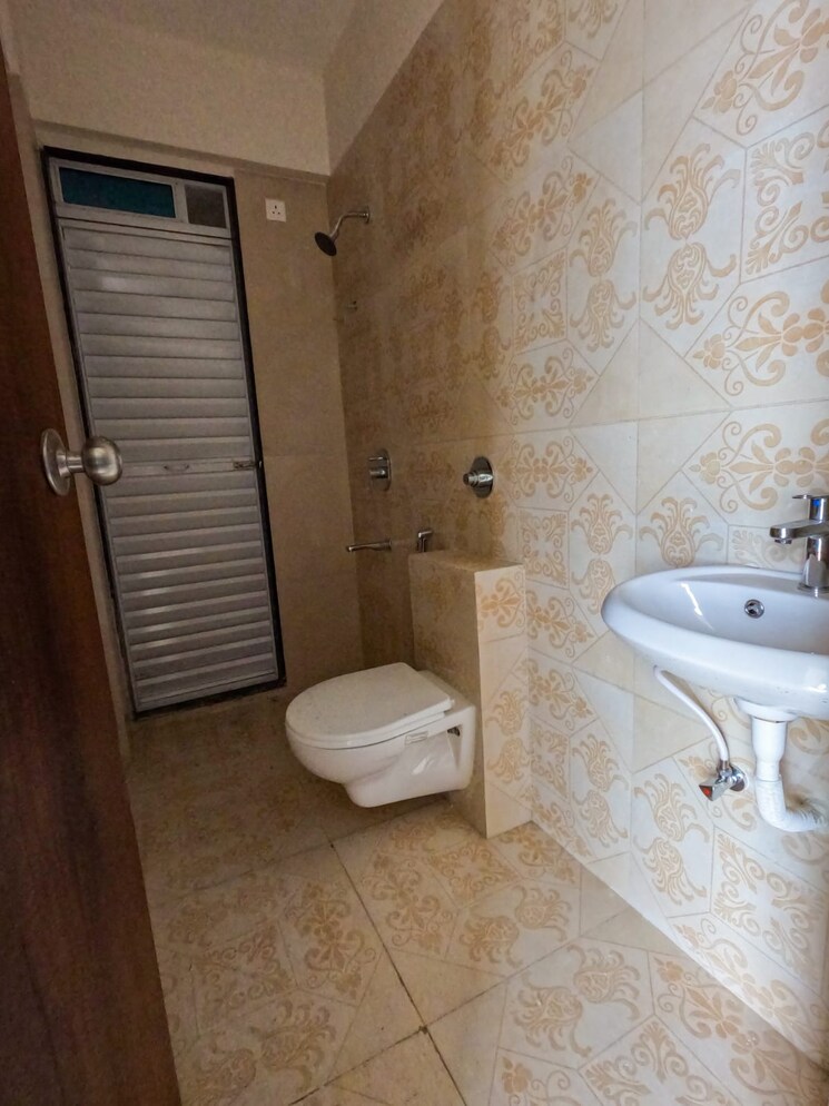 Bathroom, archstone-infinity-tower 2 Bedroom 800 Sq.Ft. Apartment In Kopar Khairane Navi Mumbai 8174882