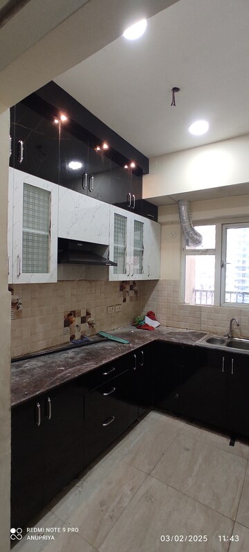 Kitchen in 2 BHK Apartment at Gaur City 2 - 14th Avenue, Sector 16c Greater Noida – for Rent