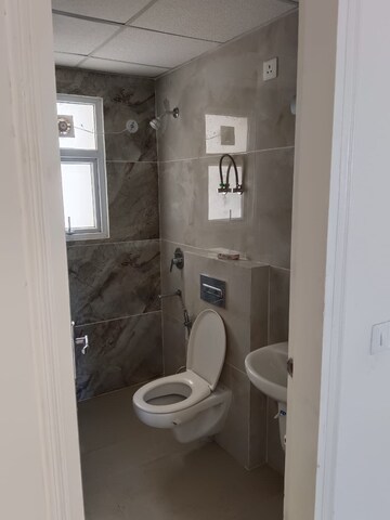 Bathroom in 3 BHK Apartment at Omaxe The Palace, Gomti Nagar – for Rent