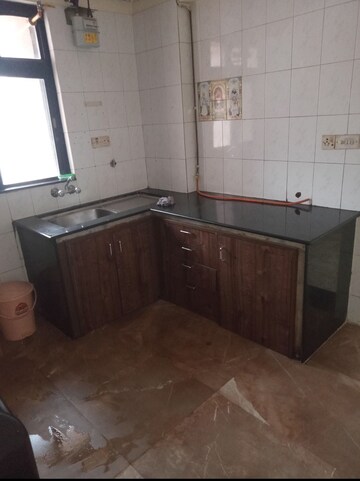 Kitchen in 2 BHK Apartment at Hiranandani Crystal Court CHS, Kharghar – for Rent