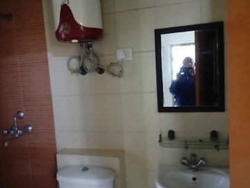 Bathroom in 3 BHK Apartment at Mahagun Mywoods, Sector 16c Greater Noida – for Rent
