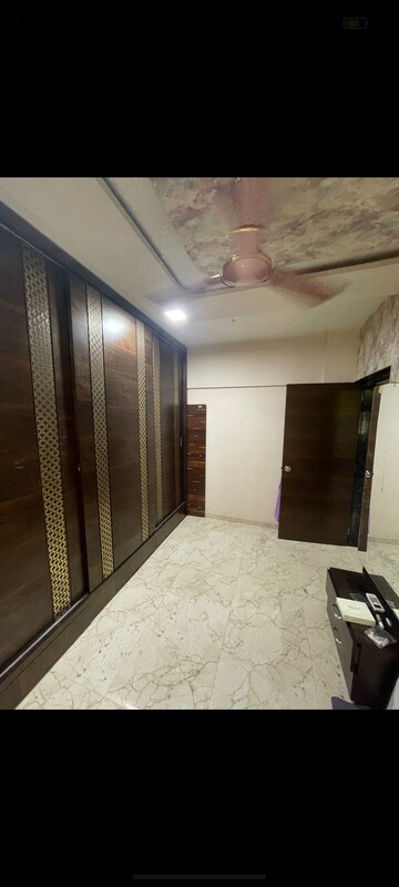 Bedroom in 1 BHK Apartment at Avishkar CHS, Kandivali West – for Rent