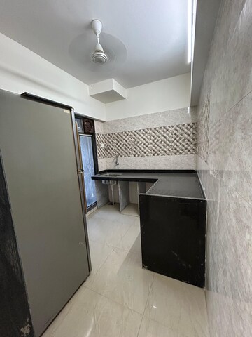 Kitchen in 2 BHK Apartment at Shree Sai Surya Kiran, Andheri West – for Rent