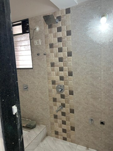 Bathroom in 2 BHK Apartment at Shree Sai Surya Kiran, Andheri West – for Rent