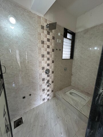 Bathroom in 2 BHK Apartment at Shree Sai Surya Kiran, Andheri West – for Rent