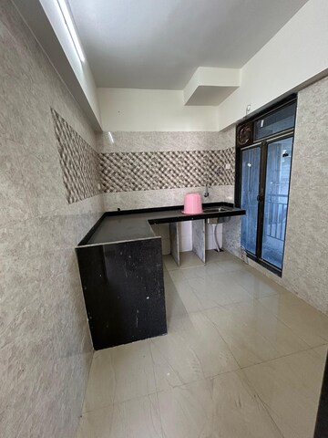 Kitchen in 2 BHK Apartment at Shree Sai Surya Kiran, Andheri West – for Rent