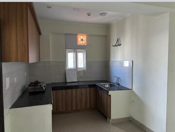 Kitchen in 3 BHK Apartment at JKG Palm Court, Sector 16c Greater Noida – for Rent