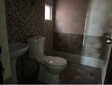 Bathroom in 3 BHK Apartment at JKG Palm Court, Sector 16c Greater Noida – for Rent