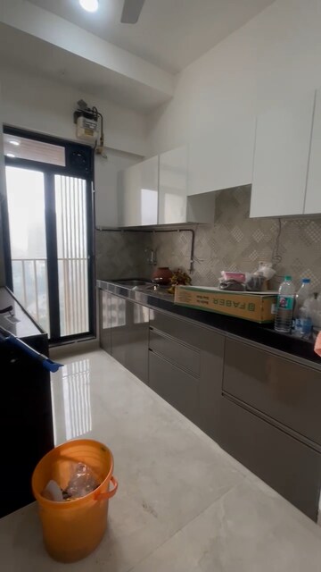 Kitchen in 4 BHK Apartment at Model Town, Andheri West – for Rent