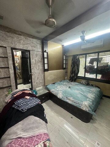Bedroom in 1 BHK Apartment at Rajesh White City, Kandivali East – for Sale