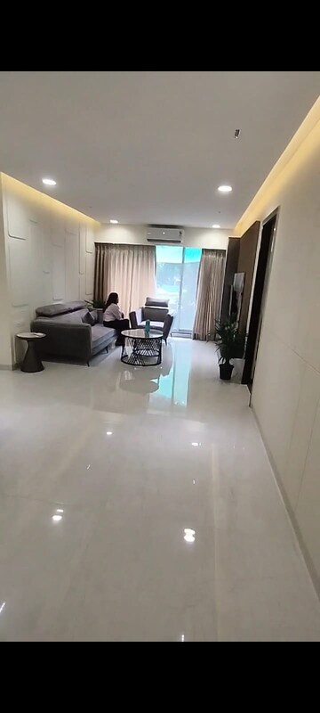 Living Room in 1 BHK Apartment at Dream Arihant Niwara Sky, Sion – for Sale