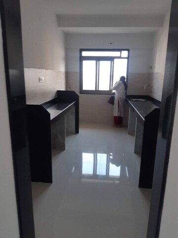 Kitchen in 3 BHK Apartment at Rajesh White City, Kandivali East – for Sale