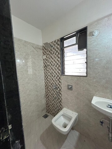 Bathroom in 2 BHK Apartment at Shree Sai Surya Kiran, Andheri West – for Rent