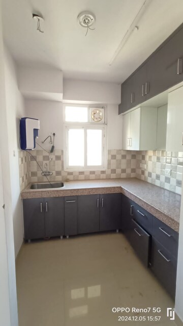 Kitchen in 3 BHK Apartment at Stellar 135, Sector 135 – for Rent