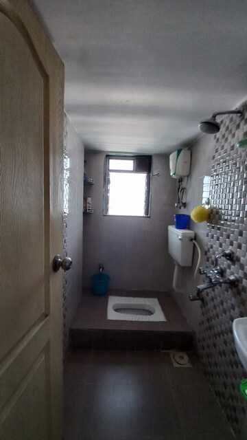 Bathroom in 2 BHK Apartment at Mangal Prabhat CHS, Kurla East – for Rent