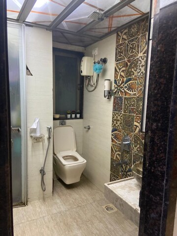 Bathroom in 1 BHK Apartment at Accord CHS Andheri West, Andheri West – for Sale