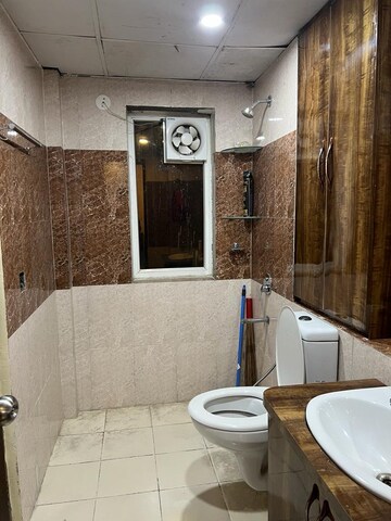 Bathroom in 3.5 BHK Apartment at Unnati Fortune The Aranya, Sector 119 – for Rent