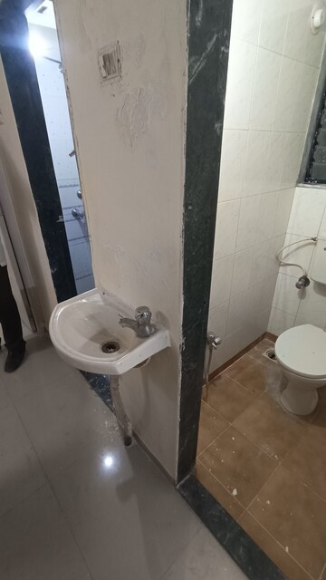 Bathroom in 1 BHK Apartment at Royal Palms, Goregaon East – for Rent