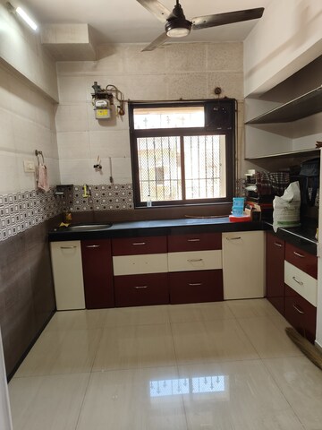 Kitchen in 1 BHK Apartment at Shubharambh Complex, Manpada – for Rent