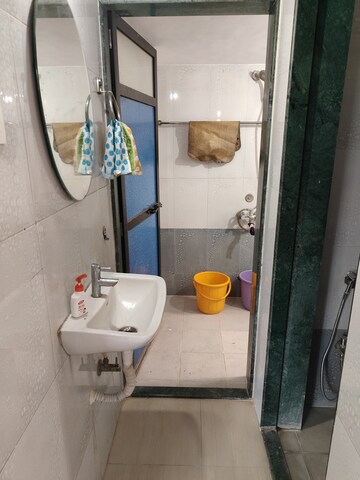 Bathroom in 1 BHK Apartment at Shubharambh Complex, Manpada – for Rent