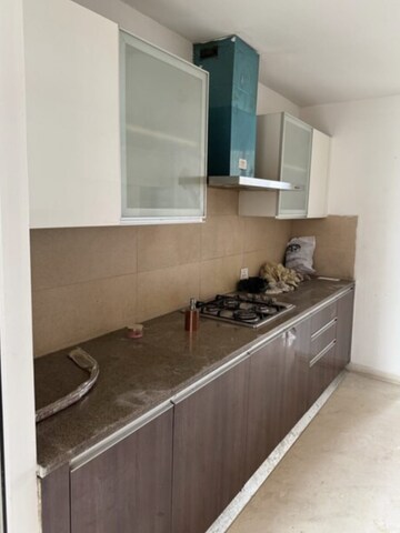 Kitchen in 3 BHK Apartment at Puri Diplomatic Greens Phase I, Sector 111 – for Rent