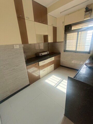Kitchen in 3 BHK Apartment at Acme Ozone, Manpada – for Rent