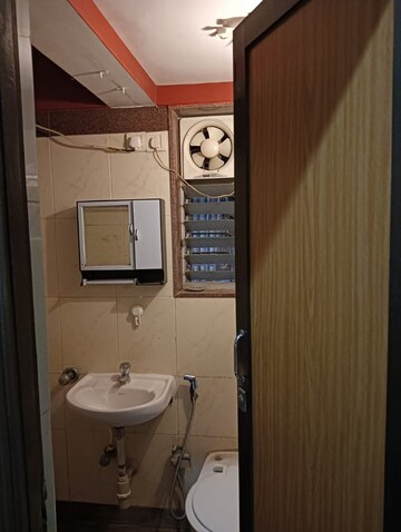 Bathroom in 3 BHK Apartment at Kalpataru Siddhachal Elite, Vasant Vihar – for Rent