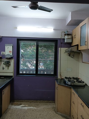 Kitchen in 3 BHK Apartment at Kalpataru Siddhachal Elite, Vasant Vihar – for Rent