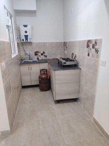 Kitchen in 1.5 BHK Apartment at Gaur City 2, Sector 16c Greater Noida – for Sale