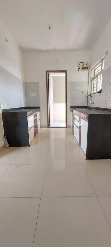 Kitchen in 2 BHK Apartment at Majestique Landmark Miami, Dhayari – for Rent