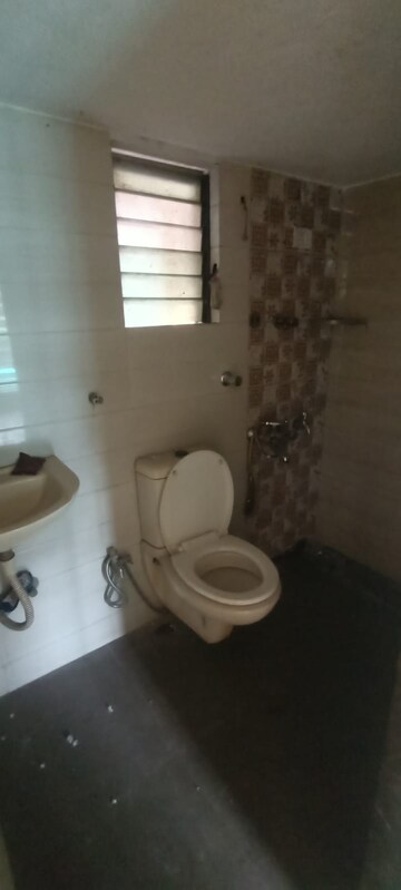 Bathroom in 1 BHK Apartment at Mira Road – for Sale