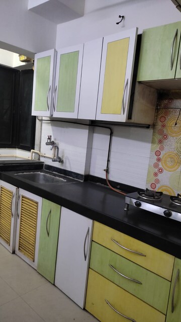 Kitchen in 1 BHK Apartment at Soham Parijat Gardens, Ghodbunder Road – for Rent