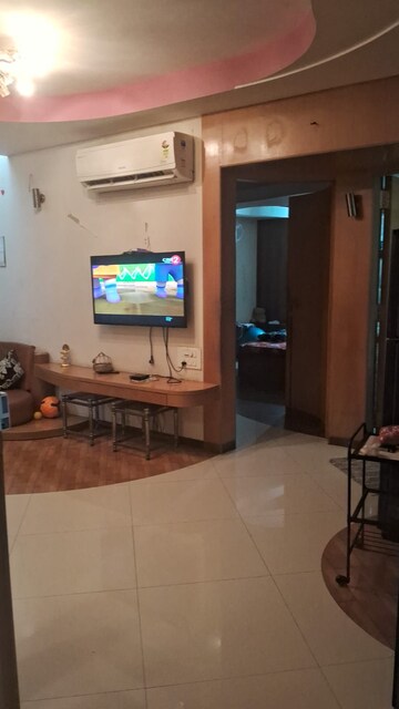 Living Room in 1 BHK Apartment at DLH New Chandra CHS, Andheri West – for Sale
