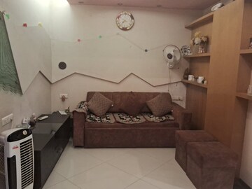 Living Room in 1 BHK Apartment at DLH New Chandra CHS, Andheri West – for Sale