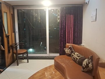 Living Room in 1 BHK Apartment at DLH New Chandra CHS, Andheri West – for Sale