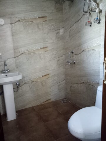 Bathroom in 3 BHK Apartment at Vasundhara Sector 1 – for Rent
