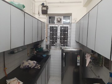 Kitchen in 2 BHK Apartment at Garden Colony, Mahim – for Rent