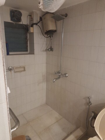 Bathroom in 2 BHK Apartment at Garden Colony, Mahim – for Rent