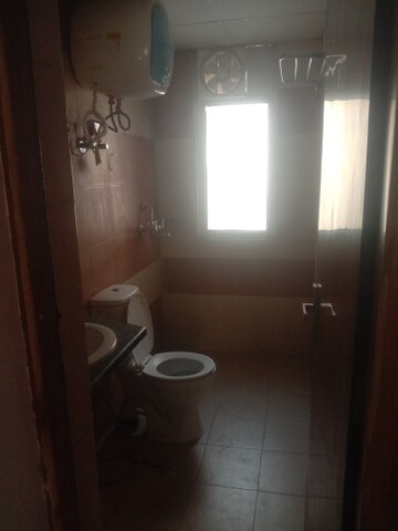 Bathroom in 3 BHK Apartment at Sector 16c Greater Noida – for Rent
