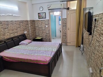 Bedroom in 3 BHK Apartment at Green Valley Heights, Dhakoli Village – for Rent