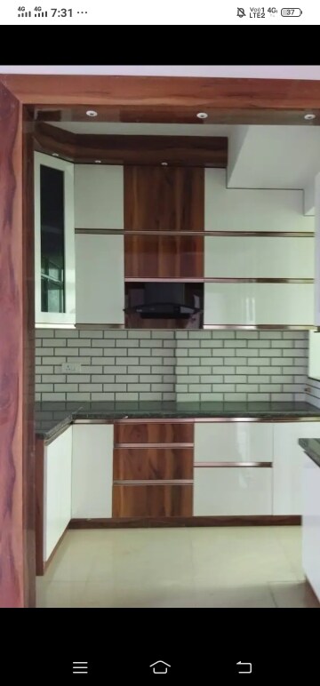 Kitchen in 3 BHK Apartment at Mahagun Mywoods, Sector 16c Greater Noida – for Rent