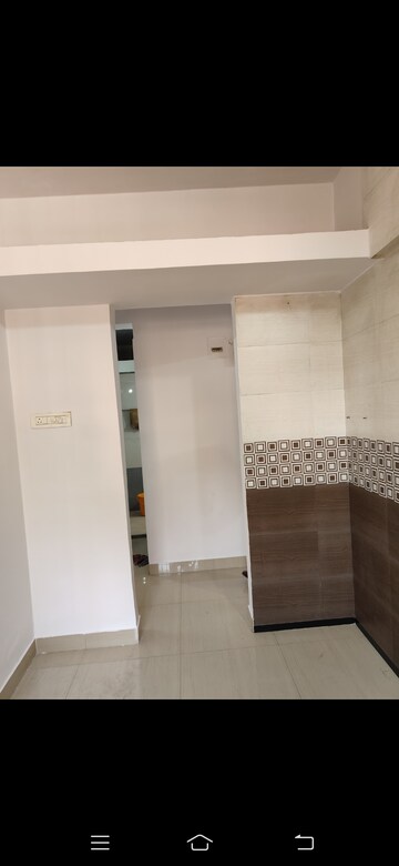 Building Lobby in 1 BHK Apartment at Shubharambh Complex, Manpada – for Rent