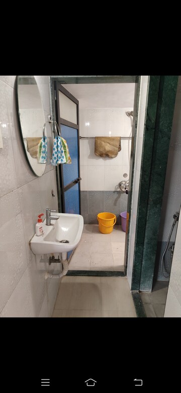 Bathroom in 1 BHK Apartment at Shubharambh Complex, Manpada – for Rent