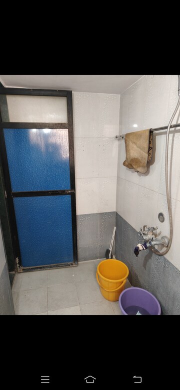 Bathroom in 1 BHK Apartment at Shubharambh Complex, Manpada – for Rent