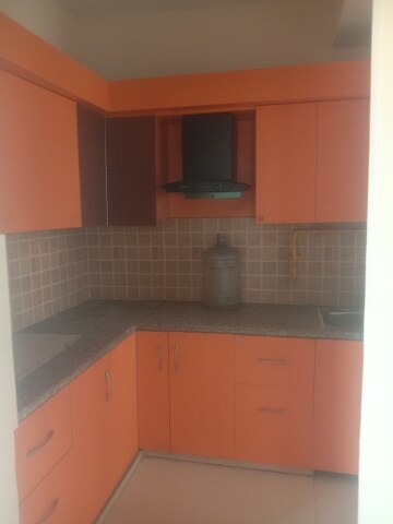 Kitchen in 3 BHK Apartment at Mahagun Mywoods, Sector 16c Greater Noida – for Rent